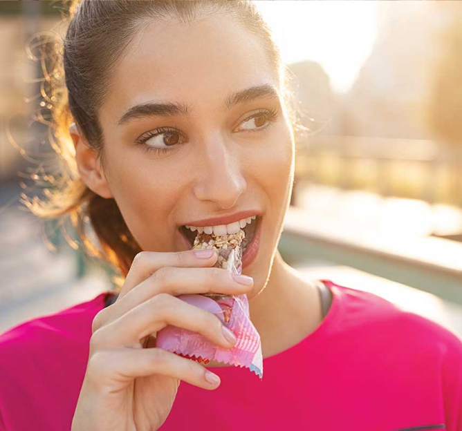 Article 2_woman-protein-bar@2x Article 2_woman-protein-bar@2x